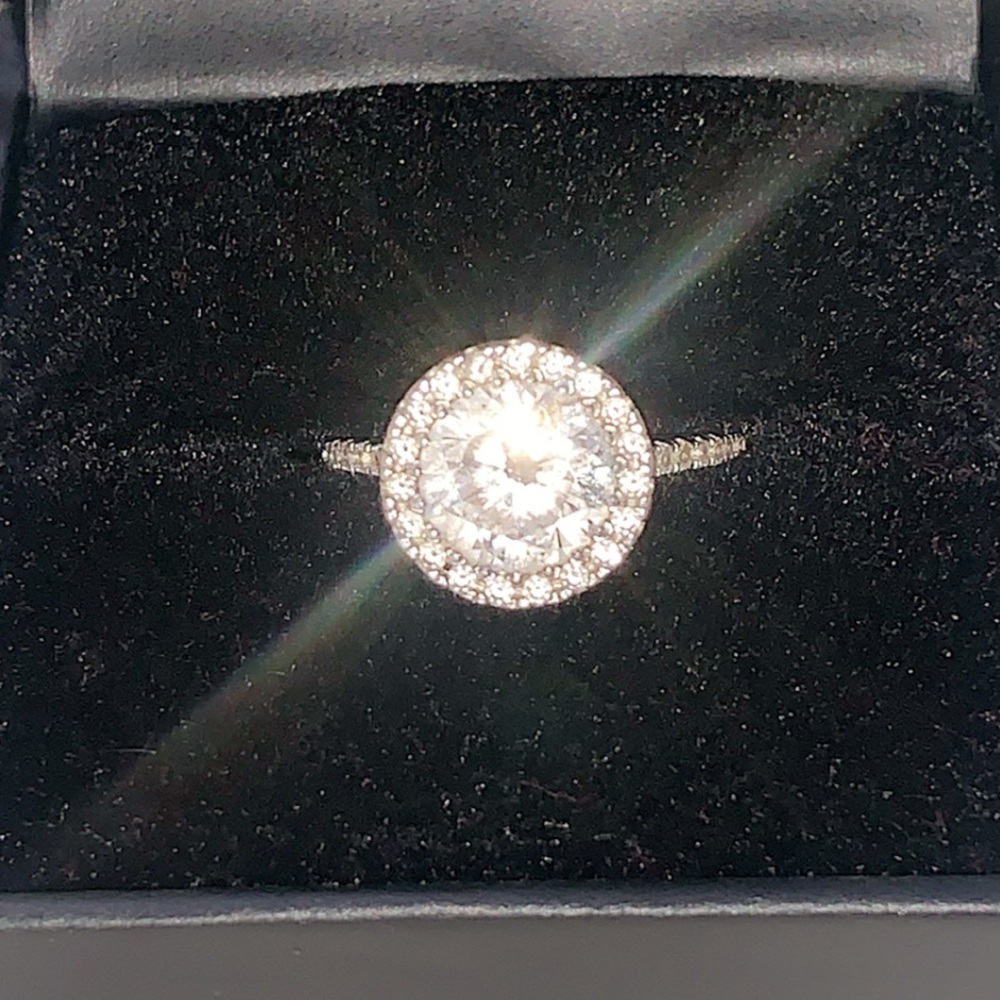 Halo solitaire promise / engagement ring